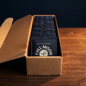 A box of 30 Full Moon sachets, packed on their sides