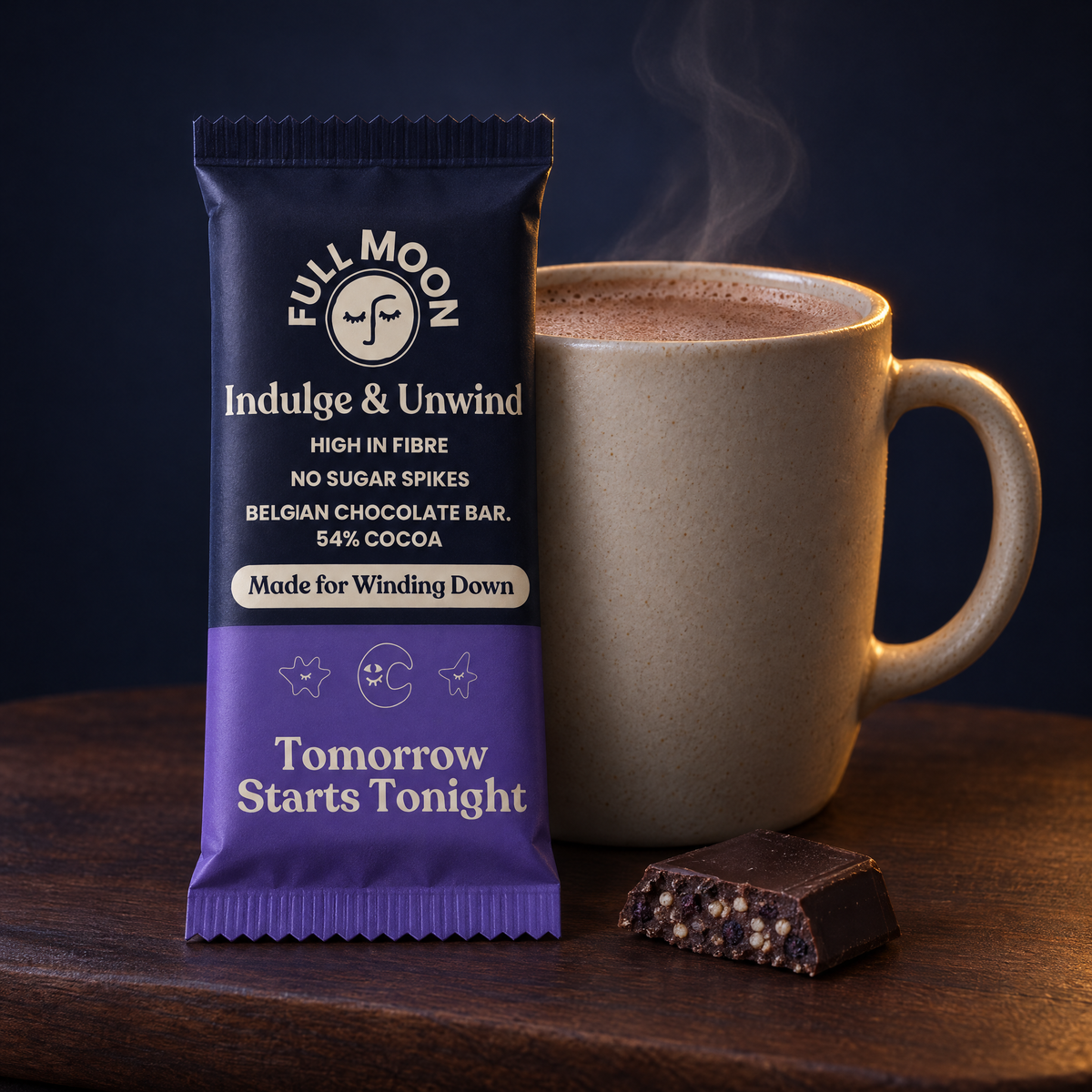 Full Moon Belgian dark chocolate bar beside a mug of hot cacao